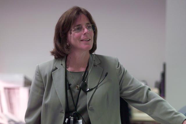 JSC2001-E-25461 (16 August 2001) --- Astronaut Barbara R. Morgan, ISS spacecraft communicator (CAPCOM), is photographed in the station flight control room (BFCR) in Houston's Mission Control Center (MCC) during the STS-105 mission.