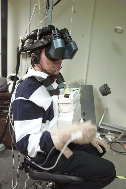 NASA image: STS-111 Training in VR lab with Expedition IV and V Crewmembers
