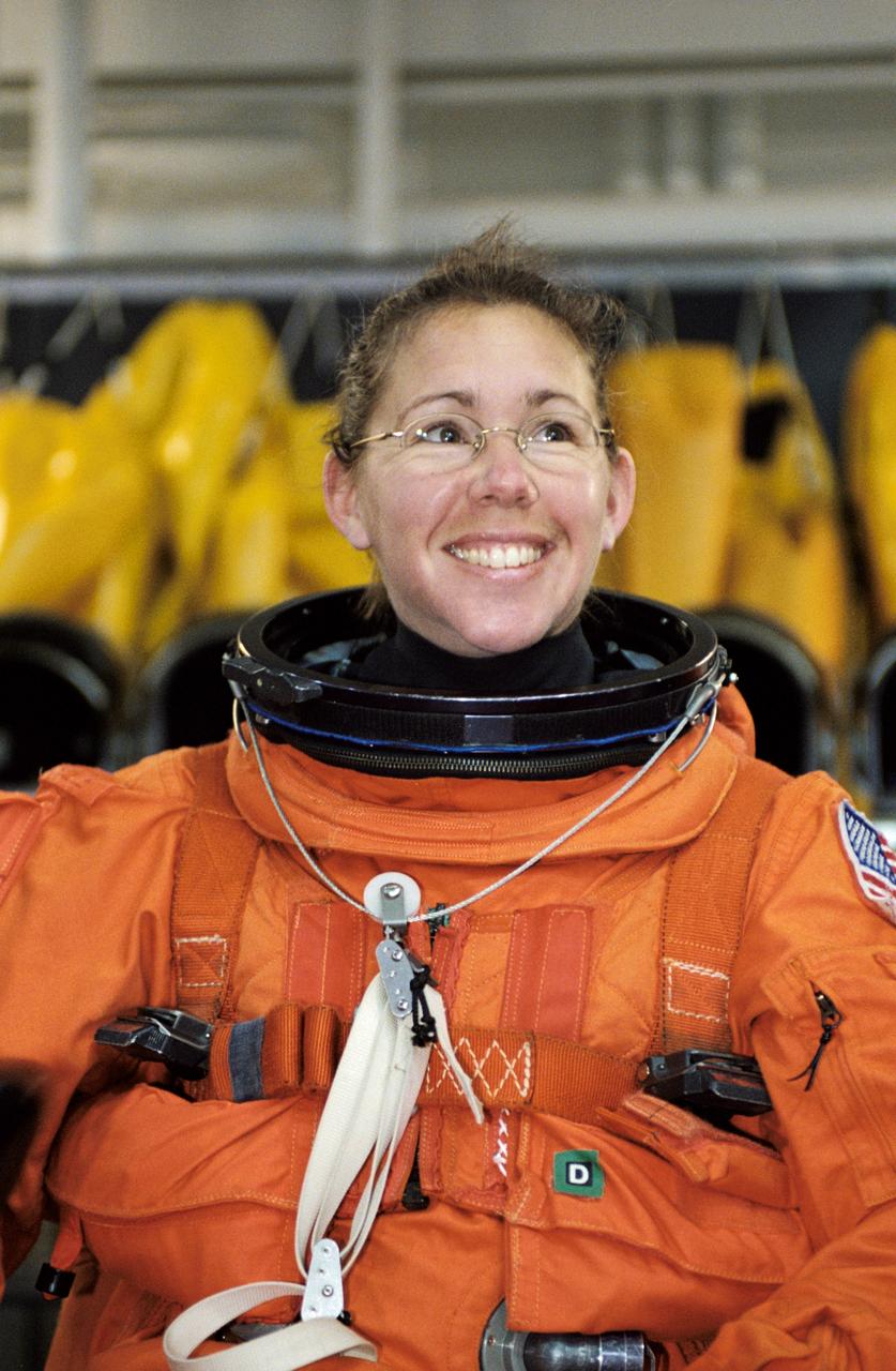 JSC2002-00520 (19 February 2002) --- Astronaut Sandra H. Magnus, STS-112 mission specialist, attired in a training version of the shuttle launch and entry suit, awaits the start of a mission training session at the Neutral Buoyancy Laboratory (NBL) near the Johnson Space Center (JSC).