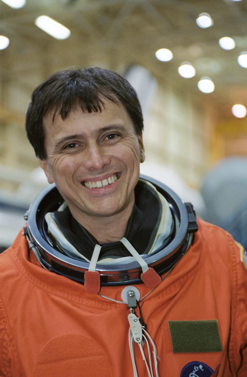 JSC2002-00722 (29 March 2002) --- Astronaut Franklin R. Chang-Diaz, STS-111 mission specialist, attired in a training version of the shuttle launch and entry suit, waits for a mission training session in the Space Vehicle Mockup Facility at the Johnson Space Center (JSC).