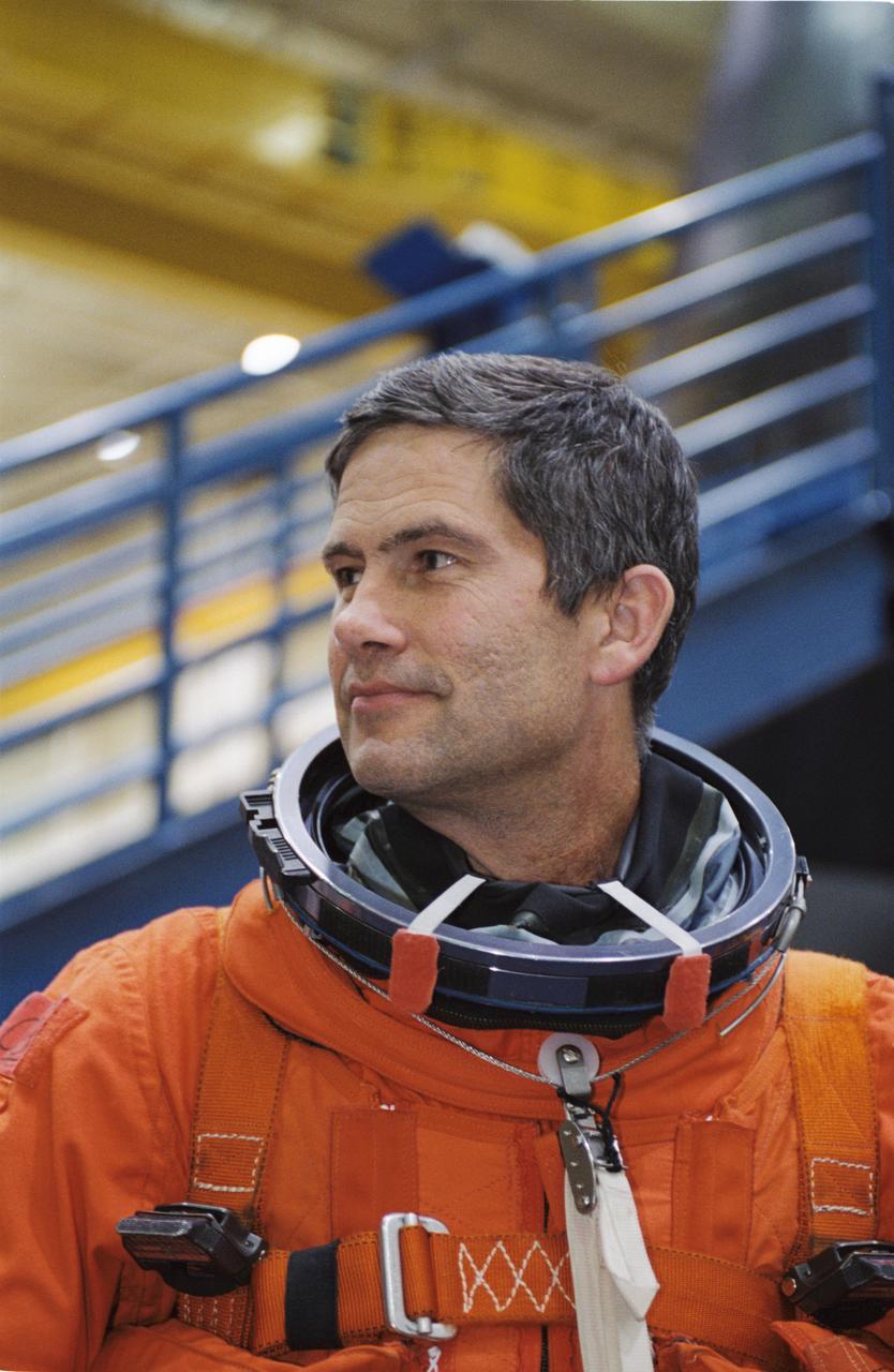 JSC2002-00726 (29 March 2002) --- Astronaut Paul S. Lockhart, STS-111 pilot, attired in a training version of the shuttle launch and entry suit, awaits a mission training session in the Space Vehicle Mockup Facility at Johnson Space Center (JSC).