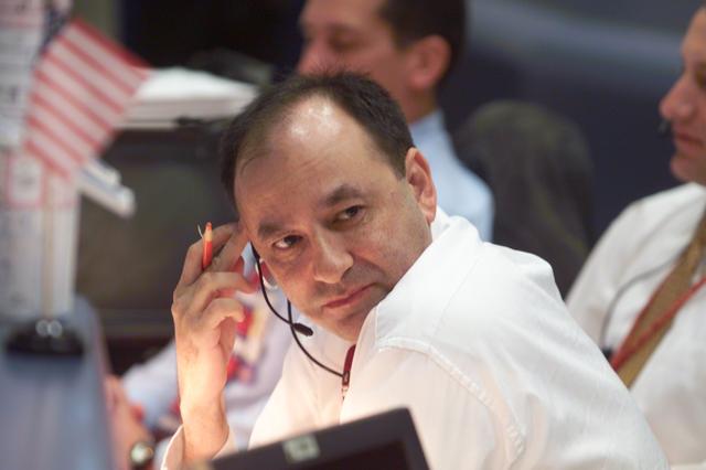 JSC2002-E-08148 (1 March 2002) ---  Astronaut Mark L. Polansky, seated at the Spacecraft Communicator (CAPCOM) console in the Shuttle Flight Control Room of the Johnson Space Center's Mission Control Center, talks on the communications "loop" with launch controllers in Florida about the pre-launch situation for the Space Shuttle Columbia and NASA's STS-109 mission at the Kennedy Space Center (KSC). Astronaut Polansky is ascent  CAPCOM for the STS-109 mission.