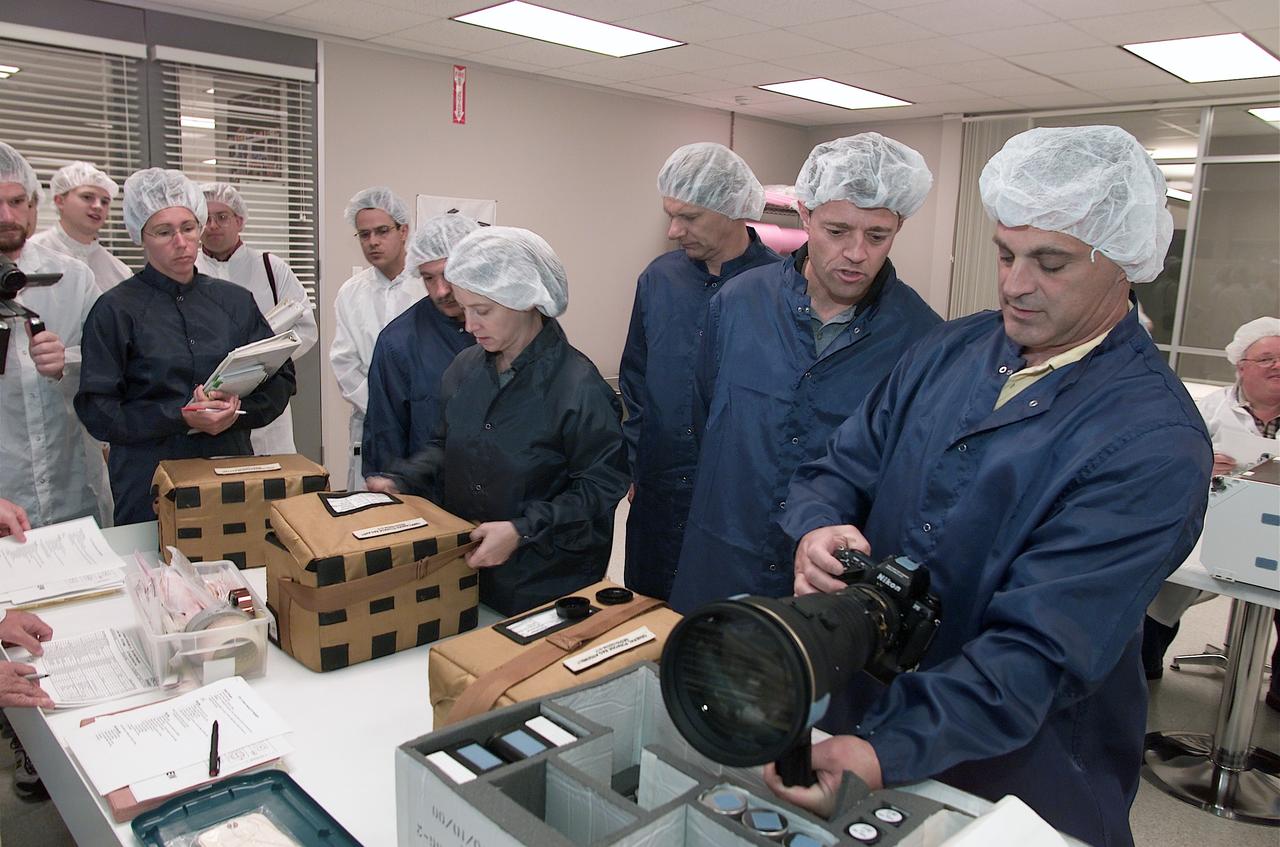 JSC2002-E-30477 (29 July 2002) --- The STS-112 crewmembers inspect flight hardware during a crew equipment bench review in an offsite facility near the Johnson Space Center (JSC). From the left are astronaut Sandra H. Magnus, cosmonaut Fyodor N. Yurchikhin, both mission specialists; astronauts Pamela A. Melroy, pilot; Piers J. Sellers, mission specialist; Jeffrey S. Ashby, mission commander, and David A. Wolf, mission specialist. Yurchikhin represents Rosaviakosmos.
