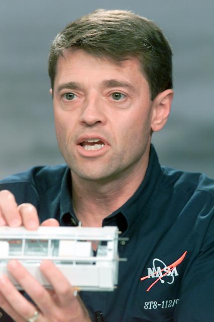 JSC2002-E-36209 (6 September 2002) --- Astronaut Jeffrey S. Ashby, STS-112 mission commander, responds to a query during a pre-flight press conference at Johnson Space Center (JSC).