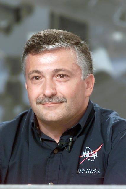 JSC2002-E-36211 (6 September 2002) --- Cosmonaut Fyodor N. Yurchikhin, STS-112 mission specialist representing Rosaviakosmos, fields a question during a pre-flight press conference at Johnson Space Center (JSC).