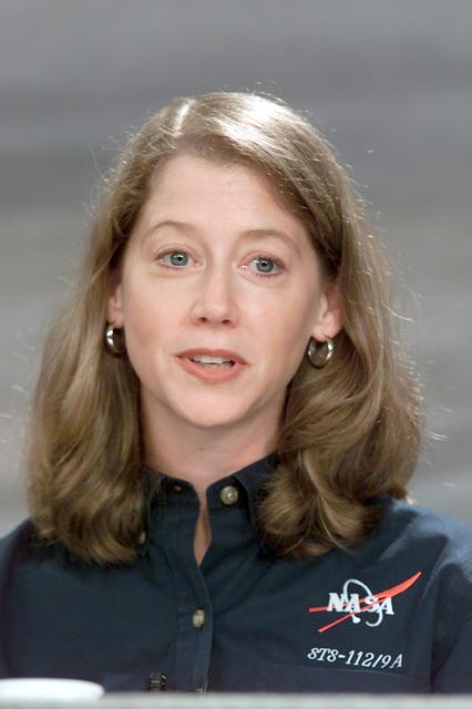 JSC2002-E-36212 (6 September 2002) --- Astronaut Pamela A. Melroy, STS-112 pilot, responds to a query during a pre-flight press conference at Johnson Space Center (JSC).
