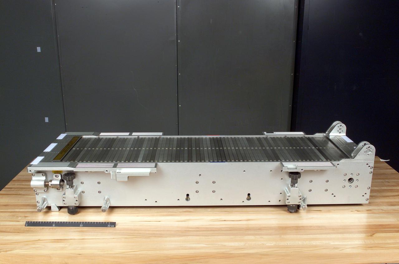 jsc2002e38731 (2002) --- Overall oblique view of the Treadmill Vibration Isolation System (TVIS) Chassis Assembly for use in the International Space Station (ISS) Service Module (SM).