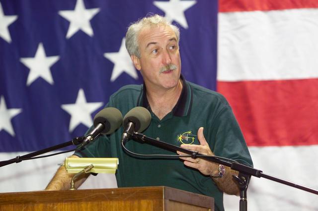 JSC2002-E-42178 (19 October 2002) --- NASA Administrator Sean O'Keefe, addresses a crowd on hand at Ellington Field's Hangar 990 during crew return ceremonies for the STS-112 crewmembers.