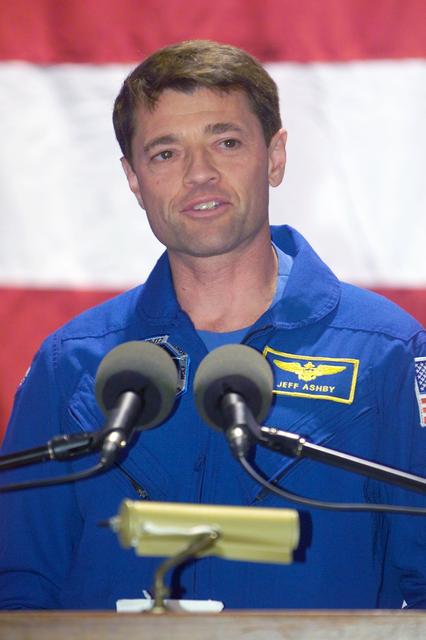 JSC2002-E-42180 (19 October 2002) ---  Astronaut Jeffrey S. Ashby, STS-112 mission commander, responds to a   Ellington Field crowd's welcome following the return to Houston by  the STS-112 mission's six crewmembers.
