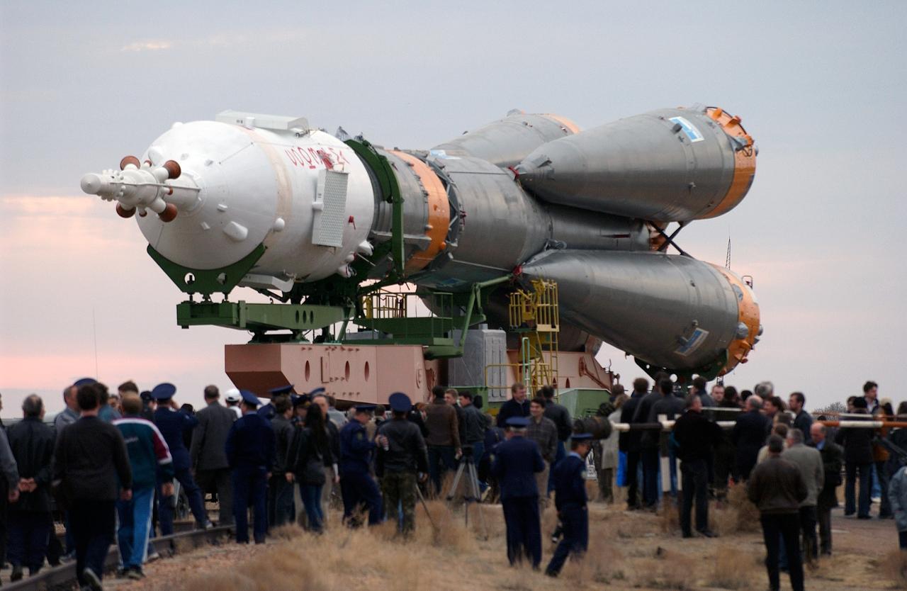 JSC2003-E-31960 (24 April 2003) --- A Soyuz rocket is rolled out of the assembly building and travels via rail to the launch pad at the Baikonur Cosmodrome, Kazakhstan. Expedition Seven is scheduled to launch onboard the Soyuz on Saturday April 26, 2003. Photo credit: NASA/Scott Andrews.