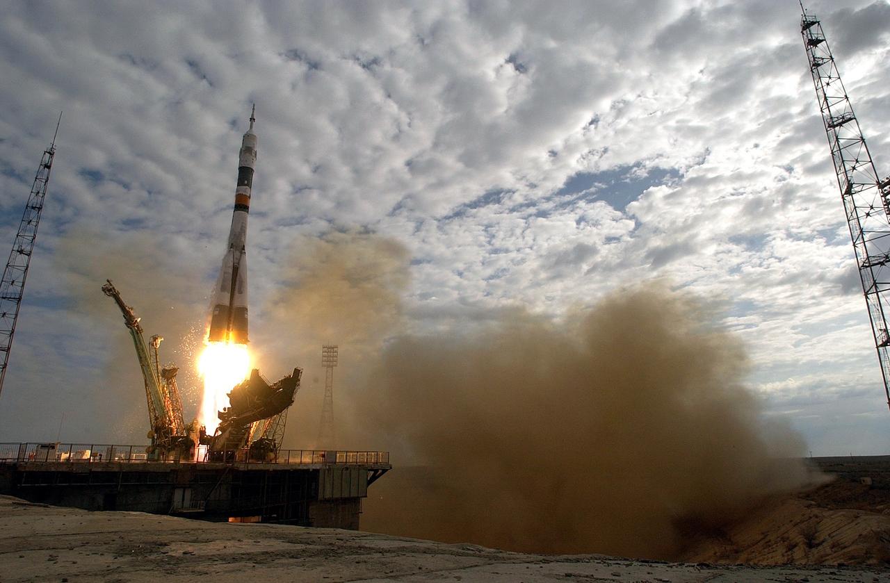 JSC2003-E-31966 (26 April 2003) --- A Soyuz spacecraft lifts off from the Baikonur Cosmodrome, Kazakhstan, at 10:54 p.m. (CDT) on April 26, 2003. Onboard were cosmonaut Yuri I. Malenchenko, Expedition Seven mission commander, and astronaut Edward T. Lu, NASA ISS science officer and flight engineer. Malenchenko represents Rosaviakosmos. Photo credit: NASA/Scott Andrews.