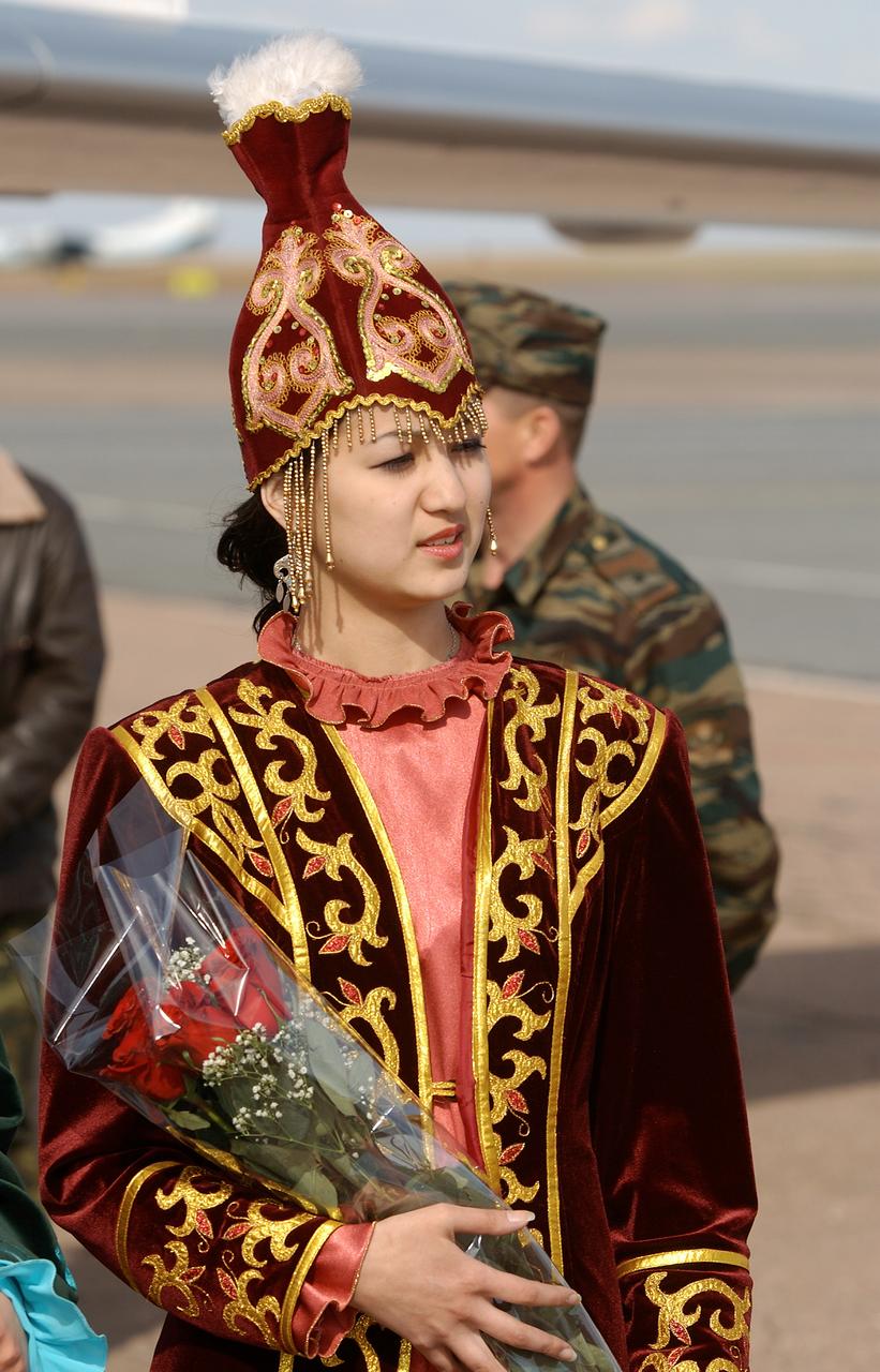 May 4, 2003, Astana, Kazakhstan. One of three local Kazakh girls who were on hand at the Astana airport to welcome the Expedition Six crew with Roses after the crew landed on the Kazakh Steppe in their Soyuz capsule. Photo Credit: "NASA/Bill Ingalls"