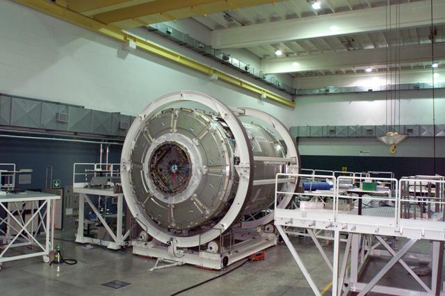 JSC2003-E-40244 (28 May 2003) --- The International Space Station Node 2 module is shown in a processing facility. Under contract of the Italian Space Agency (ASI), Alenia Spazio in Turin, Italy led a consortium of European sub-contractors to build Node 2. The module was built for NASA under a barter agreement with the European Space Agency (ESA) in exchange for the launch of the European Columbus Laboratory by the space shuttle to the International Space Station. Node 2 will provide a passageway between four International Space Station science experiment modules: the U.S. Destiny Laboratory, the Kibo Japanese Experiment Module, the European Columbus Laboratory and the Centrifuge Accommodation Module. The addition of Node 2 to the station will signify the U.S. Core Complete stage of assembly, at which time the station can support the addition of international laboratories from Europe and Japan. Photo Credit: NASA