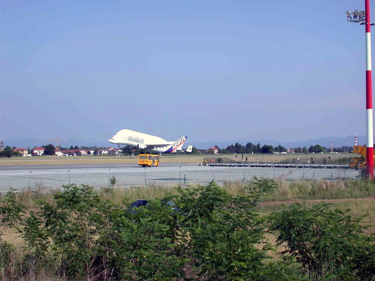 JSC2003-E-40256 (30 May 2003) An Airbus Beluga heavy-lift aircraft prepares to take off from Turin International Airport carrying the International Space Station U.S. Node 2 inside.  The aircraft departed May 30 from Turin, Italy and arrived at the Kennedy Space Center June 1 with Node 2.  Under contract of the Italian Space Agency (ASI), Alenia Spazio led a consortium of European sub-contractors to build Node 2. The module was built for NASA under a barter agreement with the European Space Agency (ESA) in exchange for the launch of the European Columbus Laboratory by the space shuttle to the International Space Station.  Node 2 will provide a passageway between four International Space Station science experiment modules: the U.S. Destiny Laboratory, the Kibo Japanese Experiment Module, the European Columbus Laboratory and the Centrifuge Accommodation Module.  The addition of Node 2 to the station will signify the U.S. Core Complete stage of assembly, at which time the station can support the addition of international laboratories from Europe and Japan. Photo Credit: Italian Space Agency (ASI)