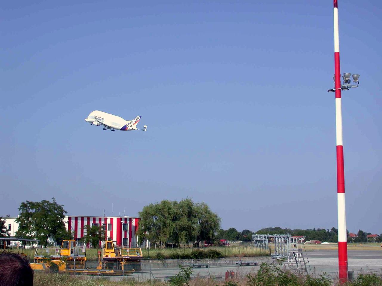 JSC2003-E-40257 (30 May 2003) --- An Airbus Beluga heavy-lift aircraft takes off from Turin International Airport carrying the International Space Station U.S. Node 2 inside. The aircraft departed May 30 from Turin, Italy and arrived at the Kennedy Space Center June 1 with Node 2. Under contract of the Italian Space Agency (ASI), Alenia Spazio led a consortium of European sub-contractors to build Node 2. The module was built for NASA under a barter agreement with the European Space Agency (ESA) in exchange for the launch of the European Columbus Laboratory by the space shuttle to the International Space Station. Node 2 will provide a passageway between four International Space Station science experiment modules: the U.S. Destiny Laboratory, the Kibo Japanese Experiment Module, the European Columbus Laboratory and the Centrifuge Accommodation Module. The addition of Node 2 to the station will signify the U.S. Core Complete stage of assembly, at which time the station can support the addition of international laboratories from Europe and Japan. Credit: ASI