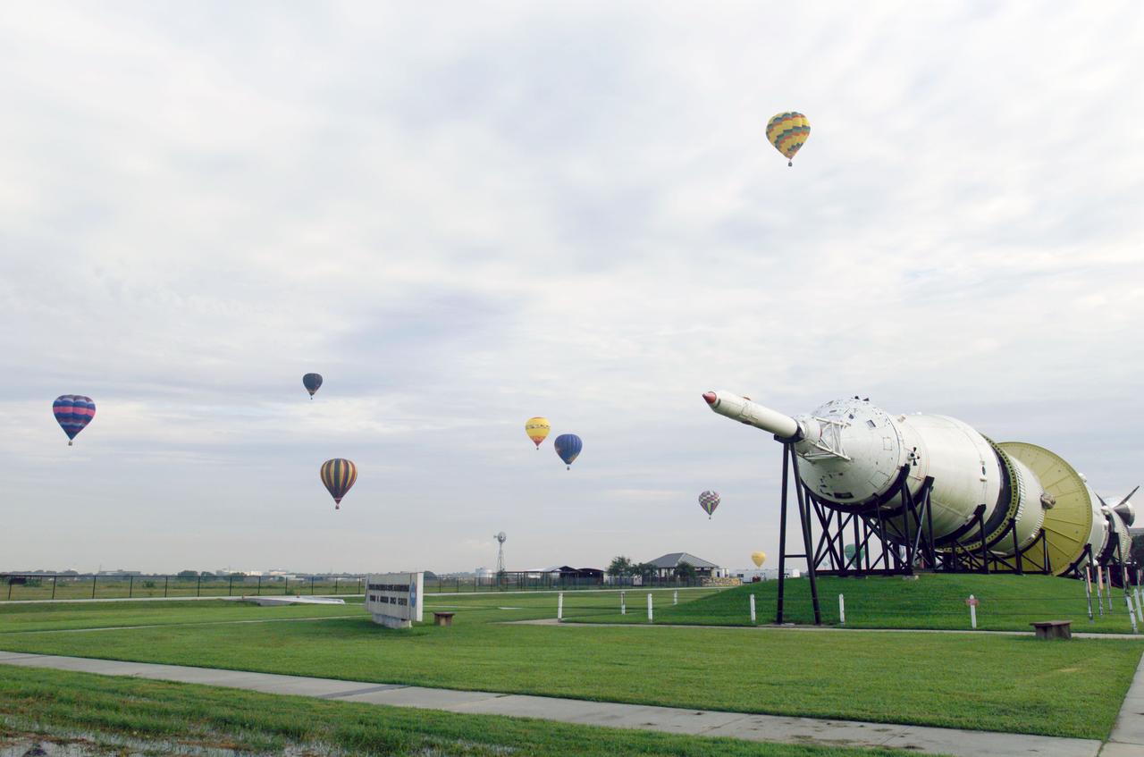 Photographic documentation of the 2003 Ballunar Liftoff Festival Activities on the grounds of the Johnson Space Center on August 22,23 and 24th. Views include: Views of Rocket Park with balloons lifting off in the background .