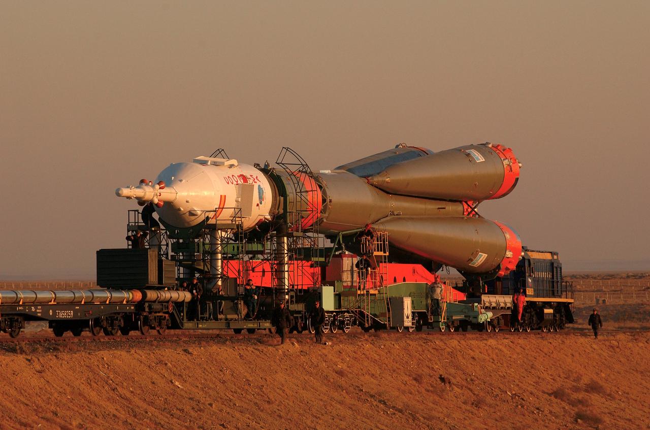 JSC2003-E-59146 (16 October 2003) --- The Soyuz TMA-3 spacecraft and its booster rocket were transported on a rail car to its launch pad and raised to its vertical launch position at the Baikonur Cosmodrome, Kazakhstan on October 16, 2003, in preparation for liftoff October 18 to carry astronaut C. Michael Foale, Expedition 8 mission commander and NASA ISS science officer; cosmonaut Alexander Kaleri, Soyuz commander and flight engineer, representing Rosaviakosmos; and European Space Agency (ESA) astronaut Pedro Duque of Spain to the International Space Station (ISS). Photo Credit: "NASA/Bill Ingalls"