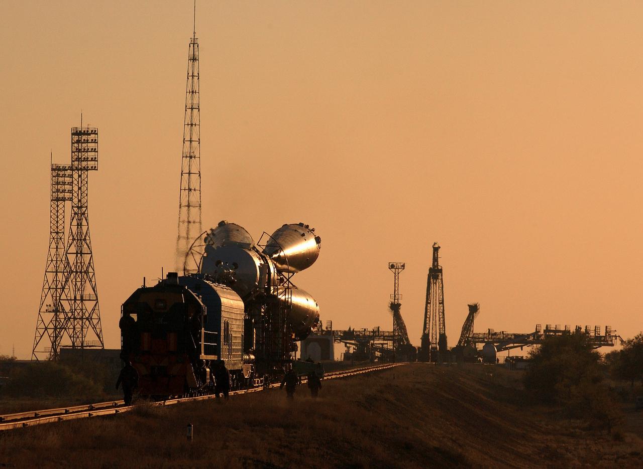 JSC2003-E-59150 (16 October 2003) --- The Soyuz TMA-3 spacecraft and its booster rocket were transported on a rail car to its launch pad and raised to its vertical launch position at the Baikonur Cosmodrome, Kazakhstan on October 16, 2003, in preparation for liftoff October 18 to carry astronaut C. Michael Foale, Expedition 8 mission commander and NASA ISS science officer; cosmonaut Alexander Kaleri, Soyuz commander and flight engineer, representing Rosaviakosmos; and European Space Agency (ESA) astronaut Pedro Duque of Spain to the International Space Station (ISS).  Photo Credit: "NASA/Bill Ingalls"