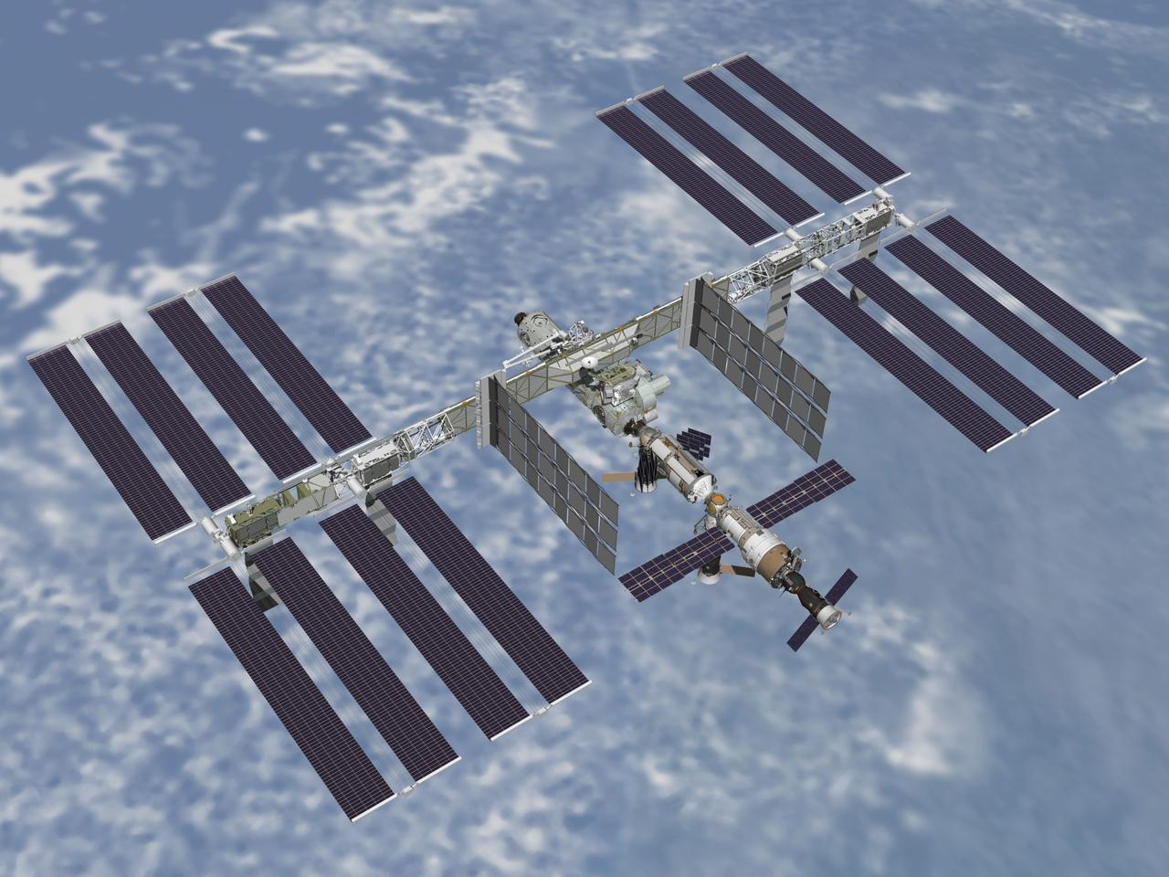 JSC2003-E-64499 (December 2003) - Aft view of the International Space Station after the installment of Node 2 during the STS-120/10A assembly mission. The addition of Node 2 signifies the US Core Complete stage of assembly, at which time the station can support the addition of international laboratories from Europe and Japan.