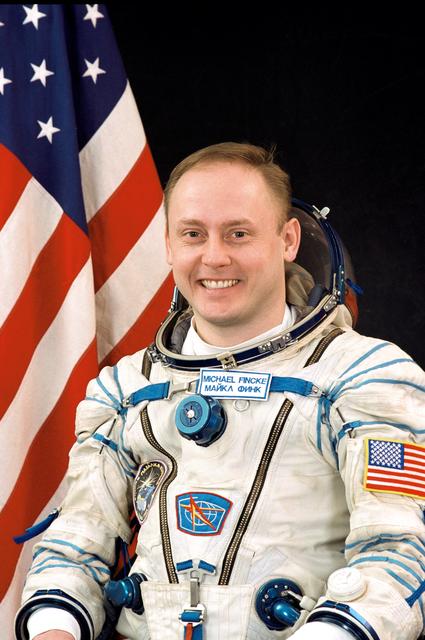NASA image: Picture of Mike Fincke in Sokol suit.