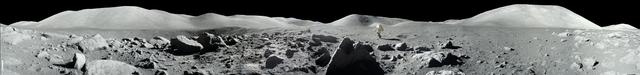 jsc2004e20304 - Panorama view of Apollo 17 lunar surface photos for Station 5 at the Taurus-Littrow landing site taken during the second moonwalk of the mission by Apollo 17 commander Eugene Cernan and lunar module pilot Harrison (Jack) Schmitt. The panoramas were built by combining Apollo 17 images starting with frame AS17-145-22159 through end frame AS17-145-22181. The panoramic images received minimal retouching by NASA imagery specialists, including the removal of lens flares that were problematic in stitching together the individual frames and blacking out the sky to the lunar horizon. These adjustments were made based on observations of the Moon walkers who reported that there are no stars visible in the sky due to the bright lunar surface reflection of the Sun.