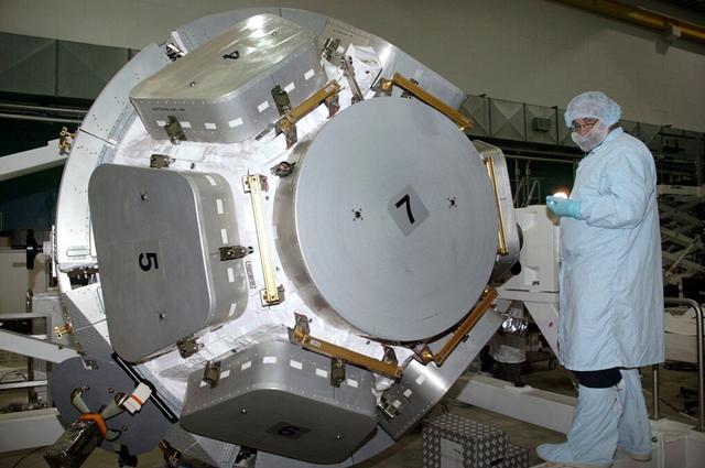 JSC2004-E-44648 (September 2004) --- A technician checks the International Space Station's Cupola in the Alenia Spazio clean room in Turin, Italy. Personnel are preparing the hardware for shipment to NASA's launch facility at Cape Kennedy, Florida.  From inside the Cupola, a dome-shaped module with seven windows, astronauts have a panoramic view for observing operations on the outside of the orbiting complex. The Cupola module provides external observation capabilities during spacewalks, docking operations, hardware surveys and for Earth and celestial studies. It also serves as the primary location for executing robot arm operations of Canadarm2. Until the Cupola is installed, crews have been using a robotic control computer station located in the Destiny Laboratory to operate the arm. The Cupola&#0146;s  windows enhance the robotic arm operator's situational awareness, supplementing camera and graphic views provided by the computer workstation. Photo Credit: Alenia Spazio