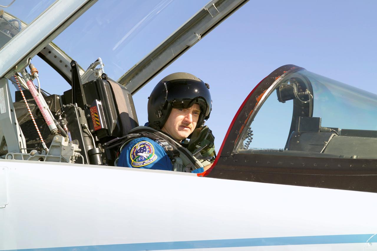 JSC2004-E-54716 (14 December 2004) --- Astronaut Mark E. Kelly, STS-121 pilot, in a T-38 trainer jet, prepares for a flight at Ellington Field near Johnson Space Center.