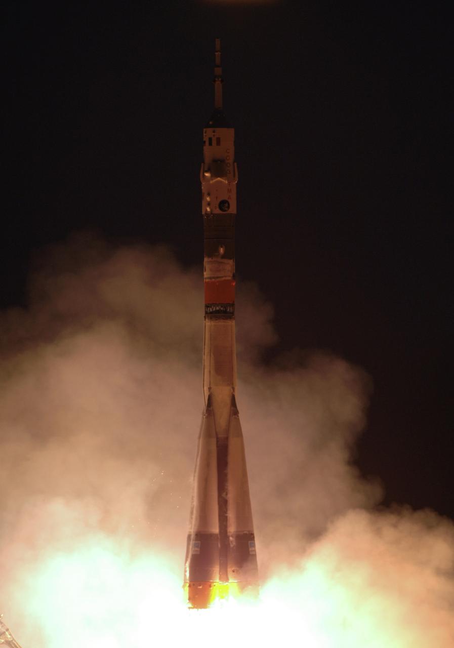 JSC2005-E-16325 (15 April 2005) --- The Soyuz TMA-6 spacecraft blasts off from the Baikonur Cosmodrome in Kazakhstan at daybreak on April 15, 2005 (Kazakhstan time), carrying cosmonaut Sergei K. Krikalev, Expedition 11 commander representing Russia's Federal Space Agency; astronaut John L. Phillips, NASA ISS science officer and flight engineer; and European Space Agency (ESA) astronaut Roberto Vittori of Italy for a two-day trip to the International Space Station (ISS). Krikalev and Phillips will spend six months on the Station, replacing Expedition 10 Commander Leroy Chiao and Flight Engineer Salizhan Sharipov, while Vittori will spend eight days on the ISS under a commercial contract between ESA and the Russian Federal Space Agency, returning to Earth with Chiao and Sharipov on April 25.  Photo Credit: NASA/Bill Ingalls