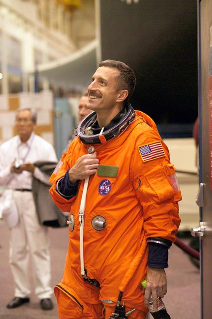 NASA image: STS-115 crew during crew bailout (91020) training in crew compartment trainer.