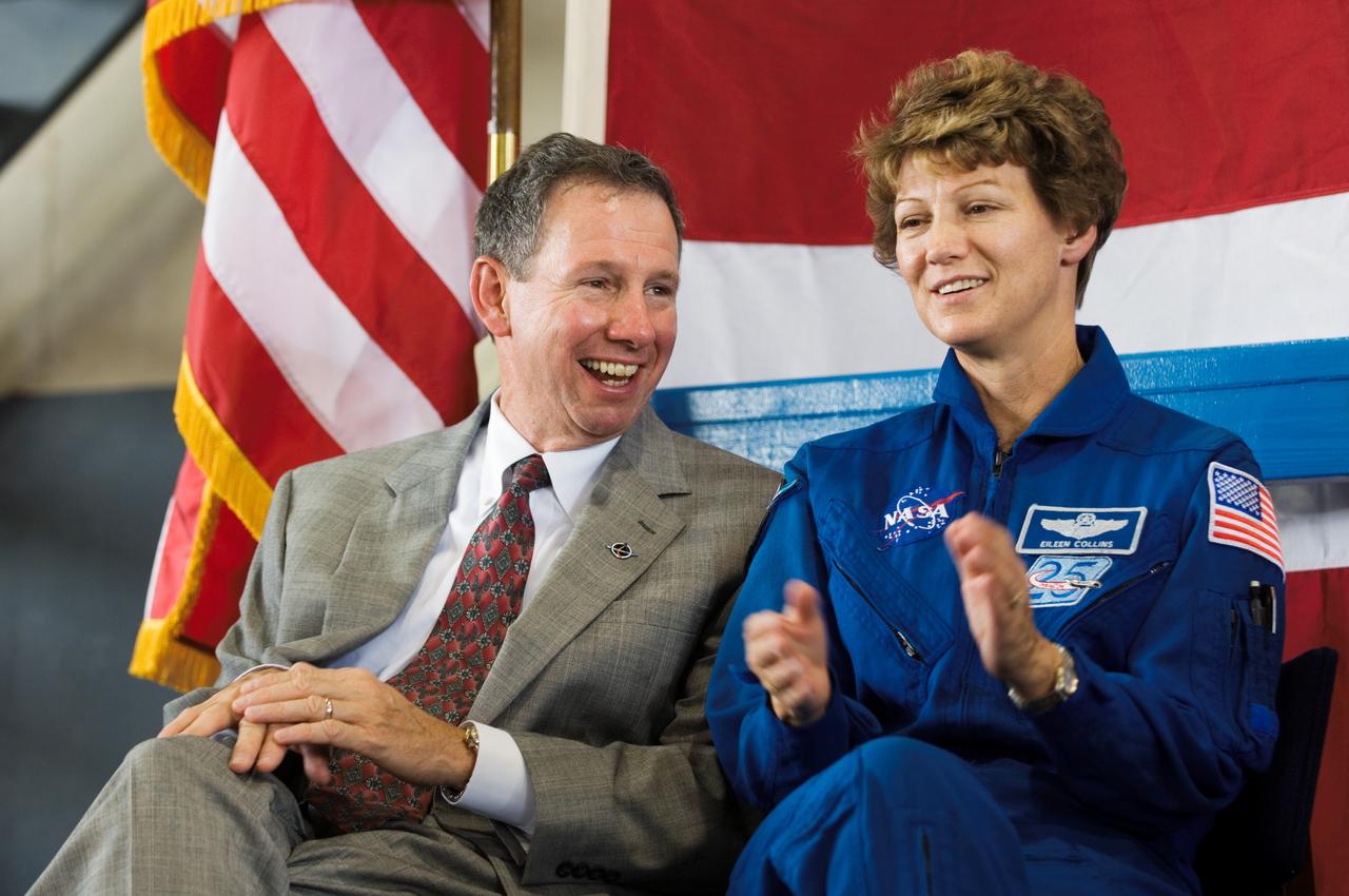 JSC2005-E-33335 (10 August 2005) --- NASA Administrator Michael Griffin and astronaut Eileen M. Collins, STS-114 commander, are pictured during the STS-114 crew return ceremonies at Ellington Field&#0146;s Hangar 276 near Johnson Space Center (JSC).