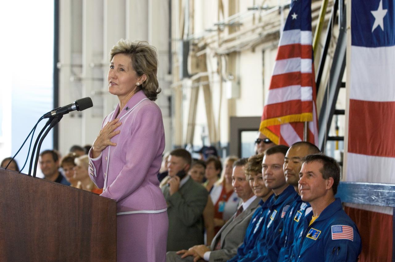 JSC2005-E-33356 (10 August 2005) --- U.S. Senator Kay Bailey Hutchison (R.-Texas) speaks to a crowd on hand at Ellington Field&#0146;s Hangar 276 near Johnson Space Center (JSC) during the STS-114 crew return ceremonies. Seated (from the left) are NASA Administrator Michael Griffin; astronauts Eileen M. Collins, commander; James M. Kelly, pilot; Soichi Noguchi, mission specialist representing Japan Aerospace Exploration Agency (JAXA); Stephen K. Robinson, mission specialist. Not pictured are astronauts Andrew S. W. Thomas, Wendy B. Lawrence and Charles J. Camarda, mission specialists.