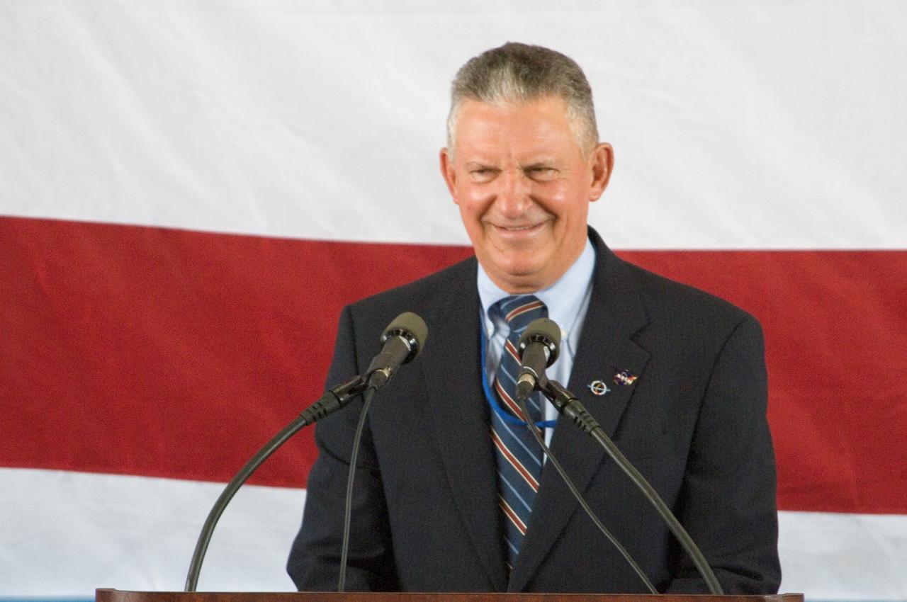 JSC2005-E-33392 (10 August 2005) --- Johnson Space Center (JSC) Director General Jefferson D. Howell, Jr. addresses a crowd on hand at Ellington Field&#0146;s Hangar 276 near Johnson Space Center (JSC) during the STS-114 crew return ceremonies.