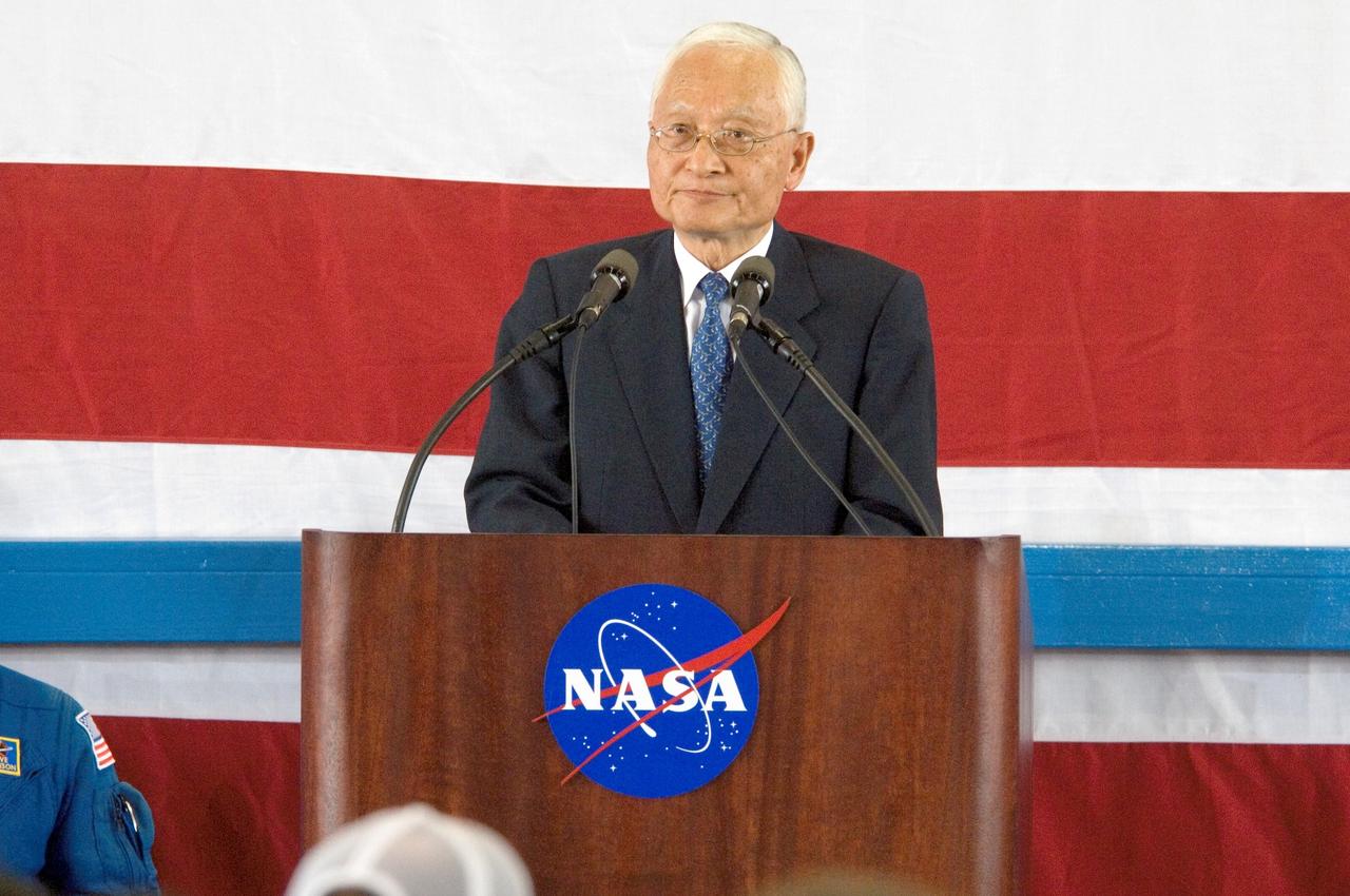 JSC2005-E-33405 (10 August 2005) --- Dr. Keiji Tachikawa, Japan Aerospace Exploration Agency (JAXA) President, addresses a crowd on hand at Ellington Field’s Hangar 276 near Johnson Space Center (JSC) during the STS-114 crew return ceremonies.