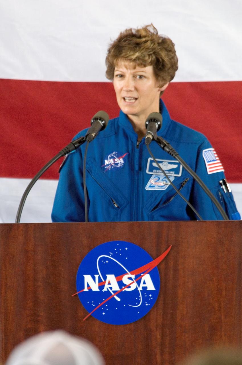 JSC2005-E-33409 (10 August 2005) --- Astronaut Eileen M. Collins, STS-114 commander, addresses a crowd on hand at Ellington Field&#0146;s Hangar 276 near Johnson Space Center (JSC) during the STS-114 crew return ceremonies.