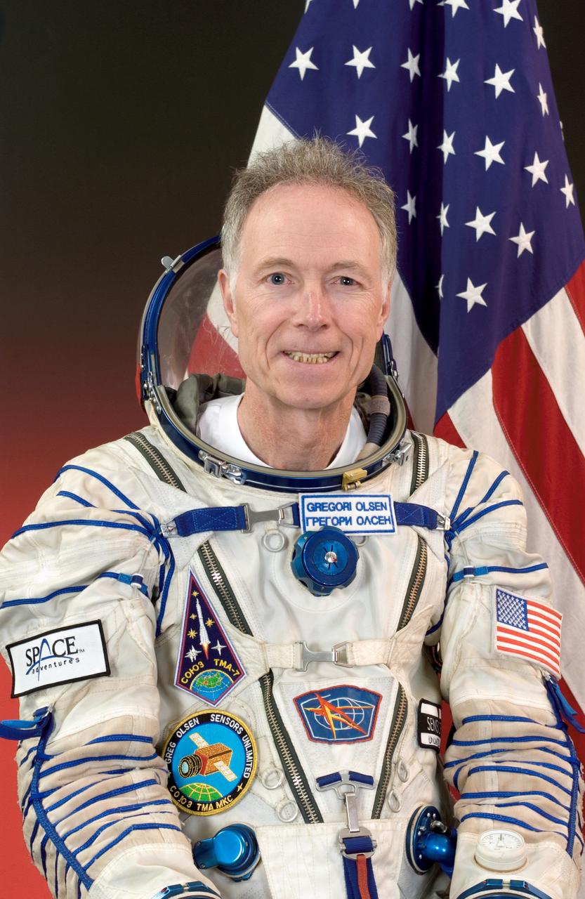 JSC2005-E-36544 (26 August 2005) --- Greg Olsen, Soyuz Spaceflight Participant, attired in a Russian Sokol suit, takes a break from a training session in Star City, Russia to pose for a portrait.