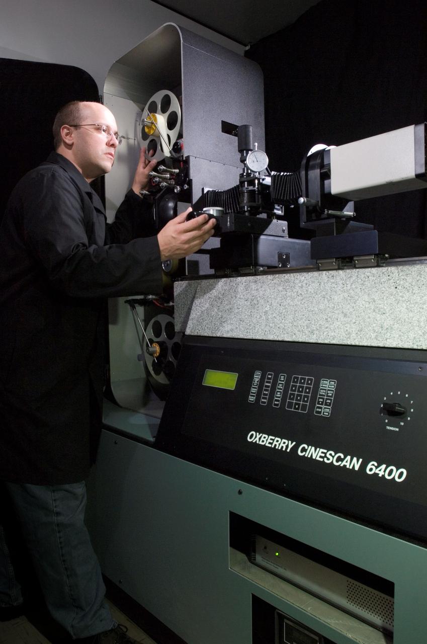 Todd Munson in the Building 8 photo lab works with the Oxberry Cinescan 6400.