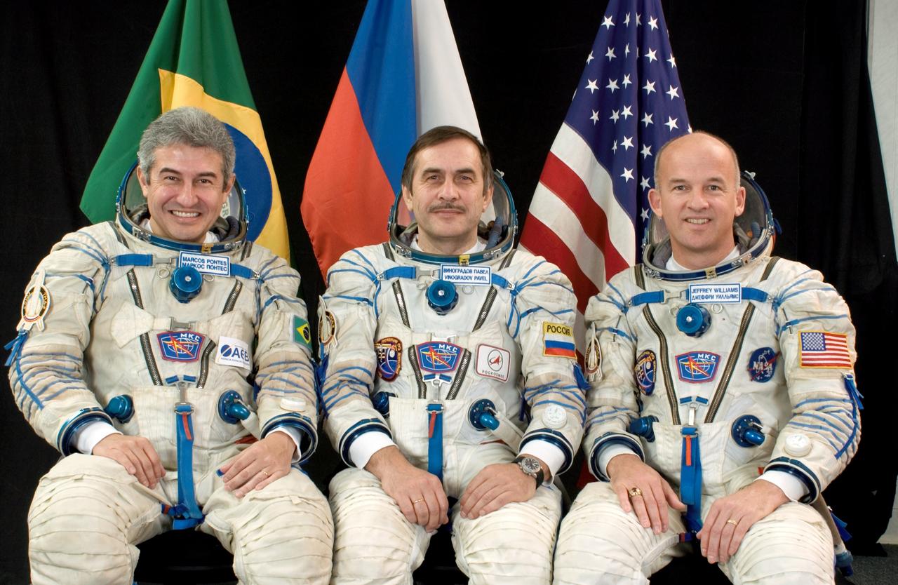JSC2006-E-00224 (22 Dec. 2005) --- Attired in Russian Sokol launch and landing suits, the next crew to launch to the International Space Station pauses from its training schedule in Star City, Russia to pose for a crew portrait. From the left are Brazilian Space Agency astronaut Marcos C. Pontes; cosmonaut Pavel V. Vinogradov, Expedition 13 commander, representing Russia's Federal Space Agency; and NASA astronaut Jeffrey N. Williams, Expedition 13 Flight Engineer and Science Officer. The crew will launch on the Soyuz TMA-8 spacecraft from Baikonur, Kazakhstan in March 2006. Pontes is flying under a commercial agreement with Russia's Federal Space Agency and will return to Earth April 1 with the Expedition 12 crew that has been on the station since October 2005. Photo Credit: Gagarin Cosmonaut Training Center
