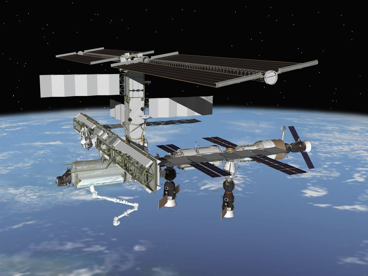 JSC2006-E-06374 (March 2006) --- Computer-generated artist’s rendering of the International Space Station following scheduled activities of March 31, 2006. This angle shows the port side view of the orbiting complex. Soyuz 12, transporting the Expedition 13 crew, docks to the Zarya Module nadir port. Soyuz 11 remains docked to the Zvezda Service Module aft port and Progress 20 resupply vehicle remains docked to the Pirs Docking Compartment.