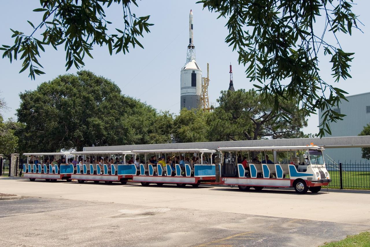 View of  a Space Center Houston tram driving past JSCs Rocket Park. Photo was taken for a Space News Roundup article.