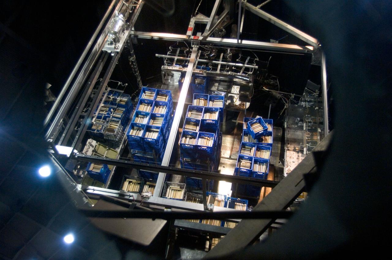 Documentation for the University of Houston (UH) Clear Lake collection of their library books after the Vacuum Chamber runs were performed to remove the water from them.  Vacuum Chamber B in Building 32 was used.