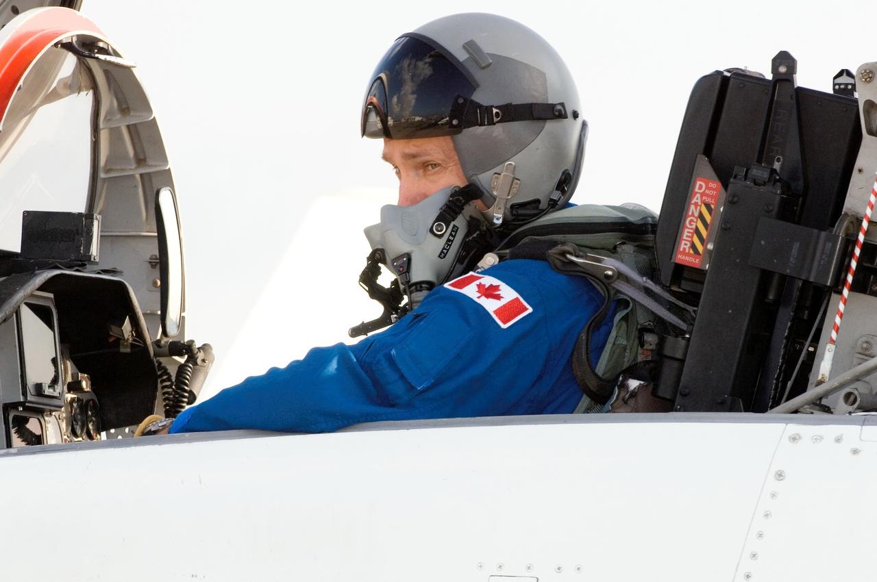 JSC2006-E-27886 (22 June 2006) --- Astronaut Steven G. MacLean, STS-115 mission specialist representing the Canadian Space Agency, photographed in a T-38 trainer jet, prepares for a flight at Ellington Field near Johnson Space Center.