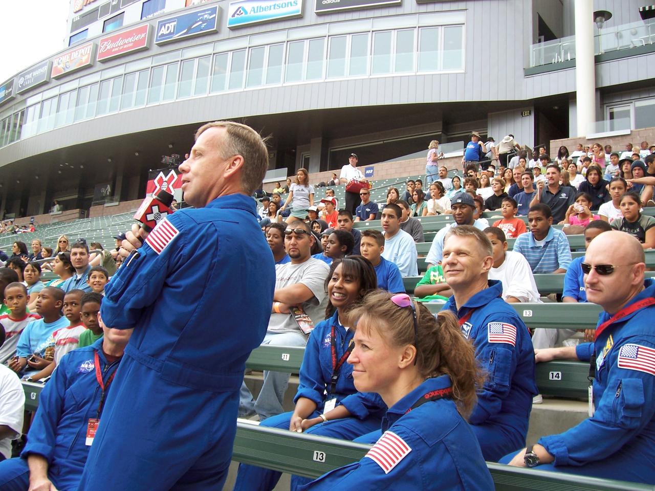 JSC2006-E-32816 (3 August 2006) --- The crew of STS-121 attended opening day of the 12th "X Games" in Los Angeles Aug. 3, discussing their recent mission to the International Space Station with students and athletes.  Astronaut Steven W. Lindsey (with microphone), commander,  and his crew take time out of the question and answer session to watch "Rally Car" practice.  The crew's visit also included presentations at the Jet Propulsion Laboratory and the California Science Center.