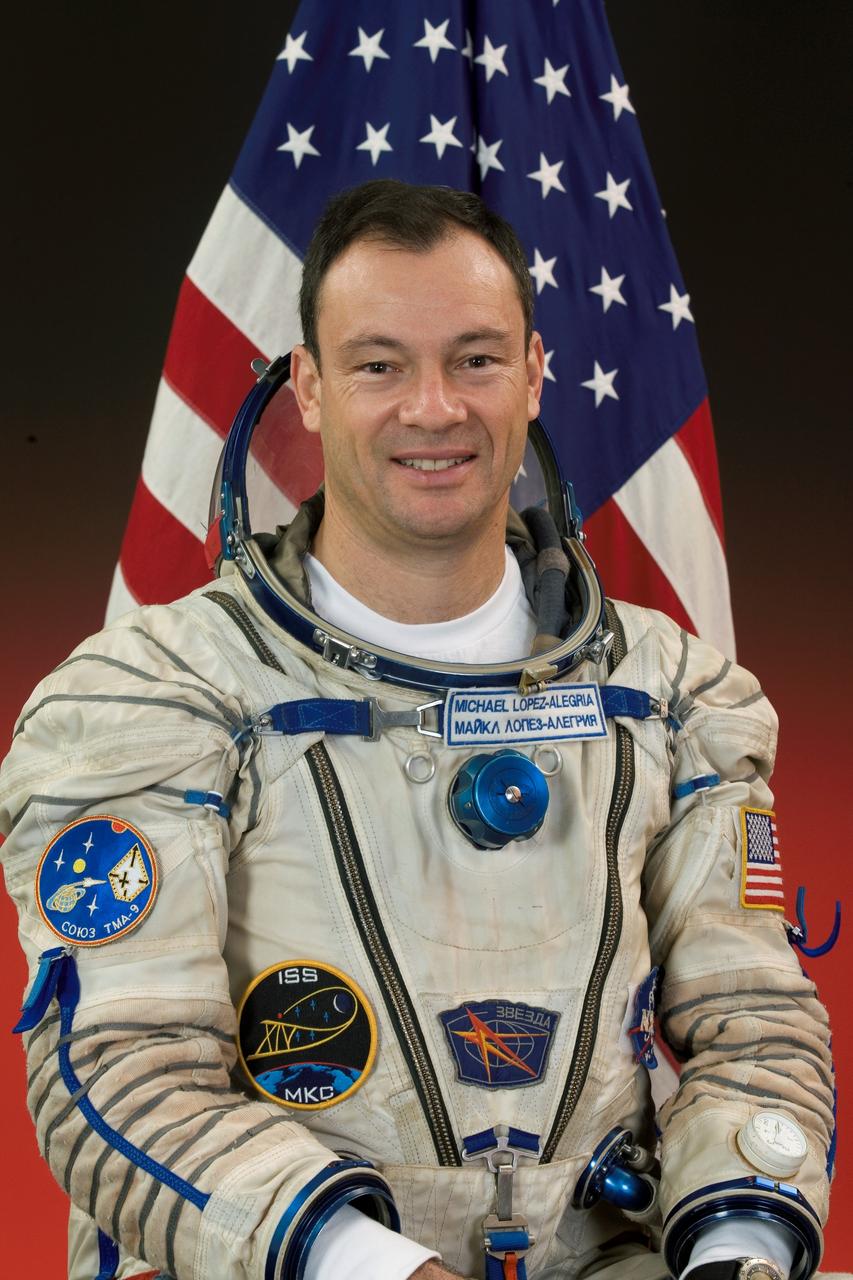 JSC2006-E-38889 (8 Nov. 2005) --- Astronaut Michael E. Lopez-Alegria, Expedition 14 commander and NASA space station science officer, attired in a Russian Sokol launch and entry suit, takes a break from training in Star City, Russia to pose for a portrait. Photo credit: Roscosmos / Gagarin Cosmonaut Training Center