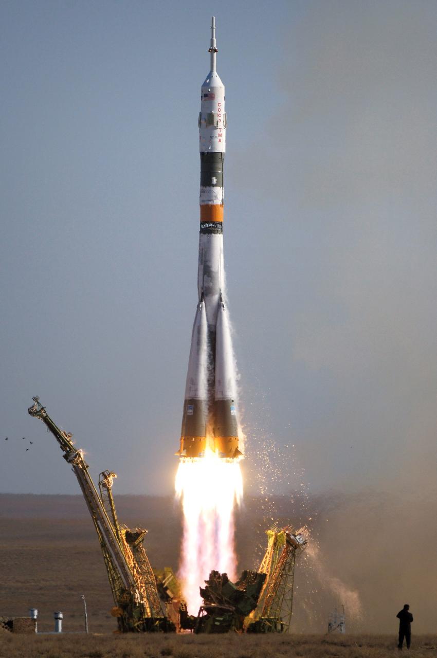 JSC2006-E-40672 (18 Sept. 2006) --- The Soyuz TMA-9 spacecraft launches from the Baikonur Cosmodrome in Kazakhstan Sept. 18, 2006 carrying a new crew to the International Space Station. The Soyuz lifted off at 10:09 a.m. Baikonur time with astronaut Michael E. Lopez-Alegria, Expedition 14 commander and NASA space station science officer; cosmonaut Mikhail Tyurin, Soyuz commander and flight engineer representing Russia's Federal Space Agency; and spaceflight participant Anousheh Ansari, who will spend nine days on the station under a commercial agreement with the Russian Federal Space Agency. Photo Credit: NASA/Bill Ingalls