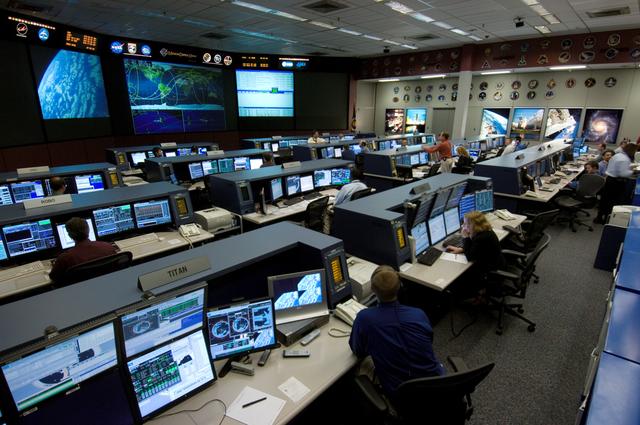 NASA image: Document handover of ISS Flight Control room to new Flight Control Room in old MCC