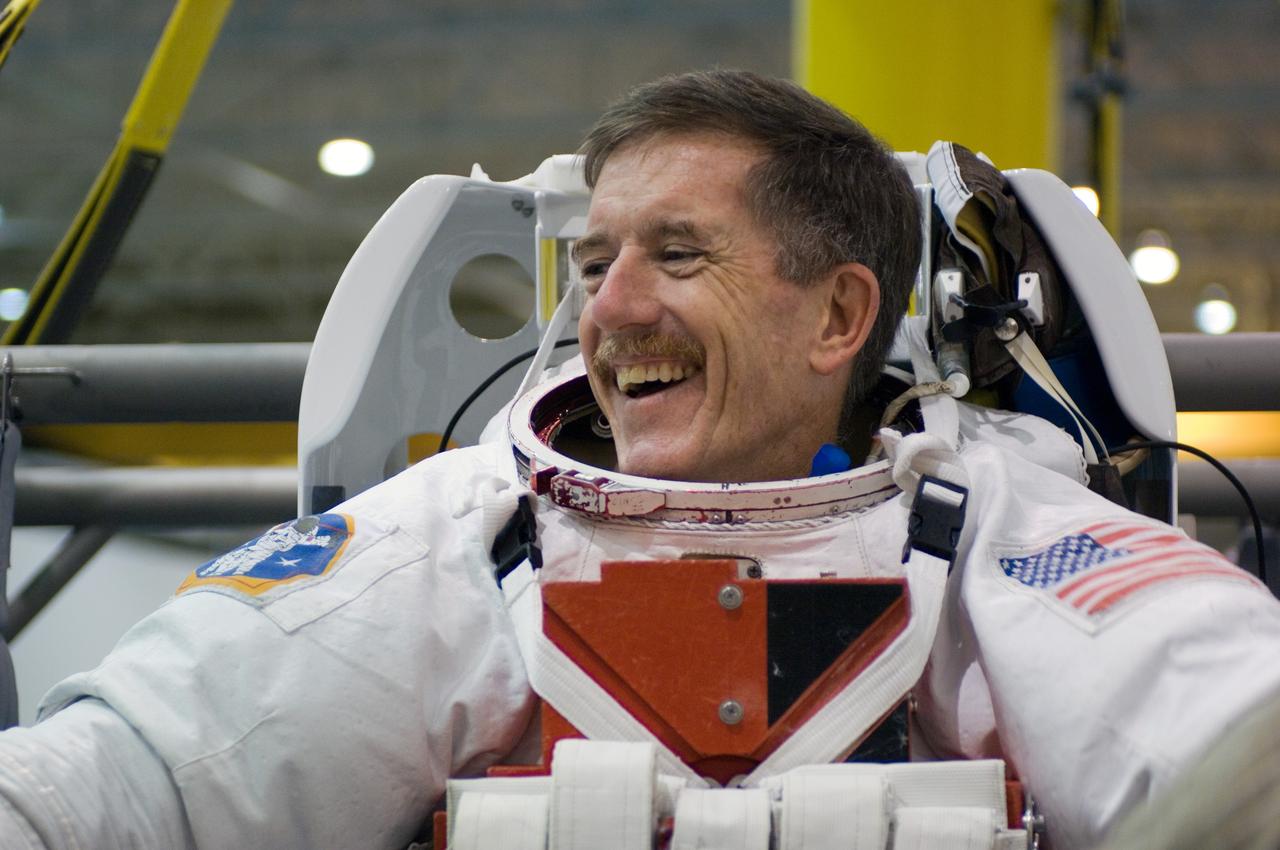 JSC2006-E-44638 (16 Oct. 2006) --- Astronaut James F. Reilly II, STS-117 mission specialist, attired in a training version of the Extravehicular Mobility Unit (EMU) spacesuit, is about to begin a training session in the waters of the Neutral Buoyancy Laboratory (NBL) near the Johnson Space Center.