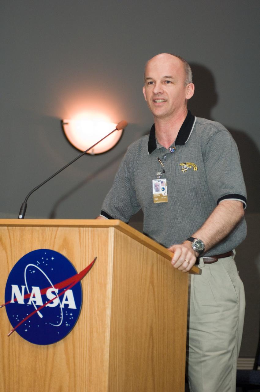 JSC2006-E-46699 (26 Oct. 2006) --- Jeffrey N. Williams, Expedition 13 NASA space station science officer and flight engineer, speaks from the lectern in the ballroom of the Gilruth Center at Johnson Space Center during the welcome home ceremony for the Expedition 13 crewmembers.