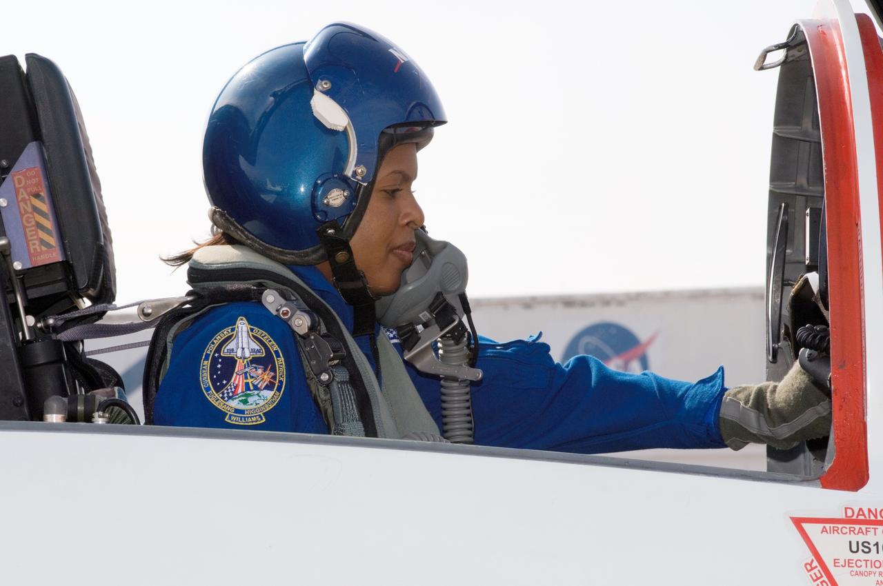 JSC2006-E-49052 (13 Nov. 2006) --- Astronaut Joan E. Higginbotham, STS-116 mission specialist, photographed in the rear station of a NASA T-38 trainer jet at Ellington Field near Johnson Space Center, prepares for a flight to the Kennedy Space Center, Florida.