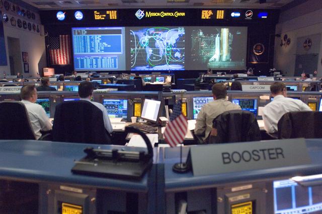 NASA image: STS-116 Flight Controllers on console during mission - (Ascent/Entry Shift)