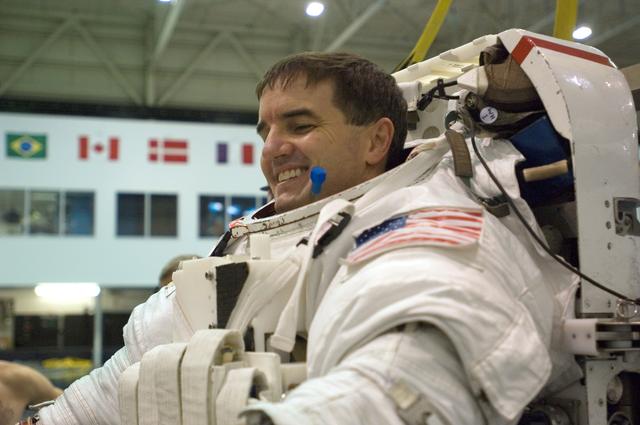 NASA image: STS-122 crew member Rex Walheim suiting up